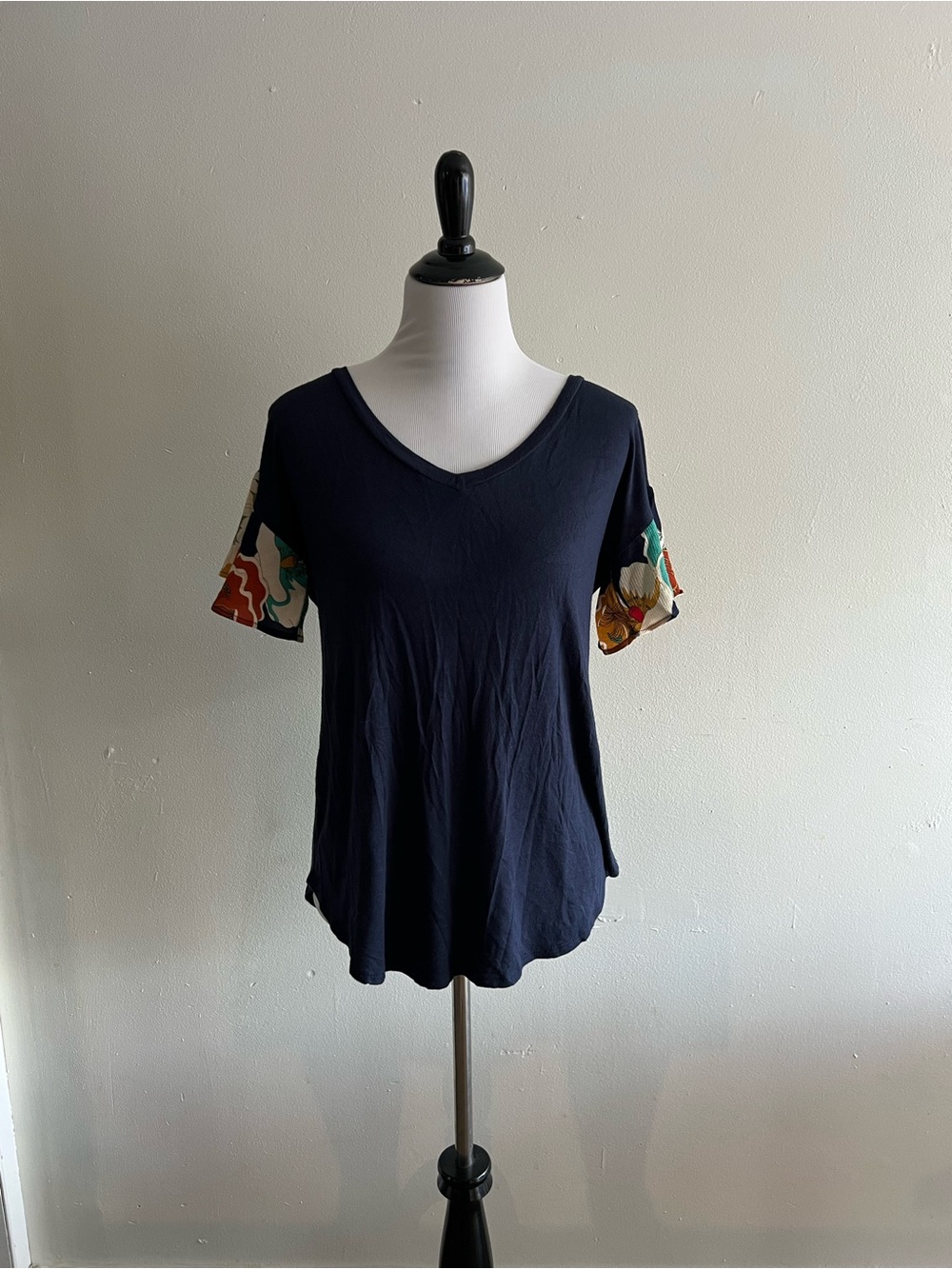Mai Soli V-Neck Navy Short Sleeve Tee with Colorful Floral Sleeve Accents
